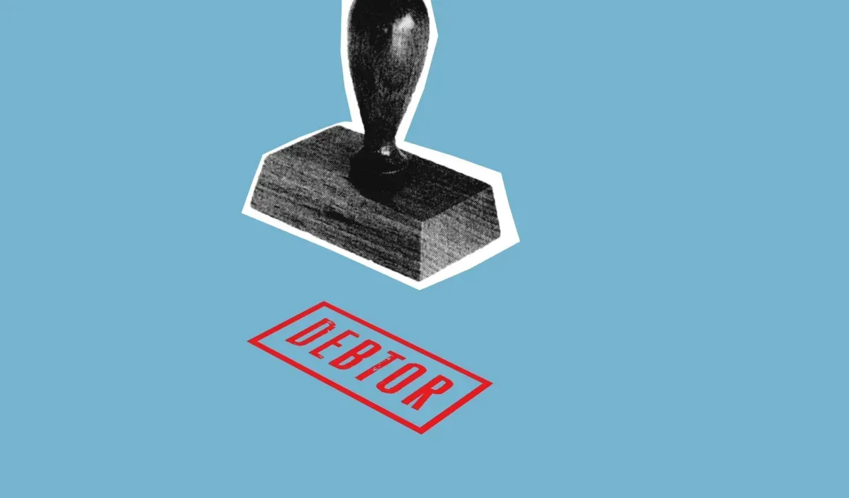 Carimbo com a palavra Debtor sobre fundo azul